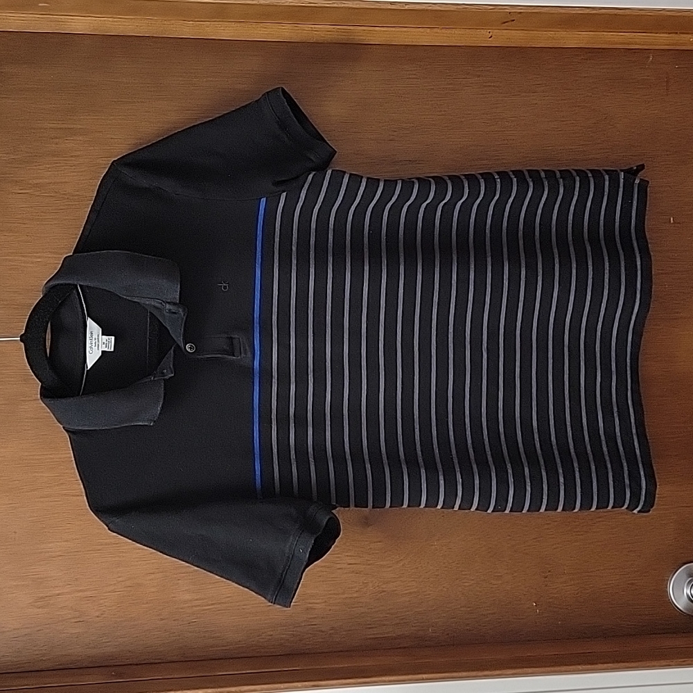 Calvin Klein body fit Polo type shirt size medium.